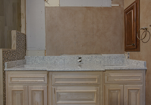 Bathroom sink in the middle of being painted