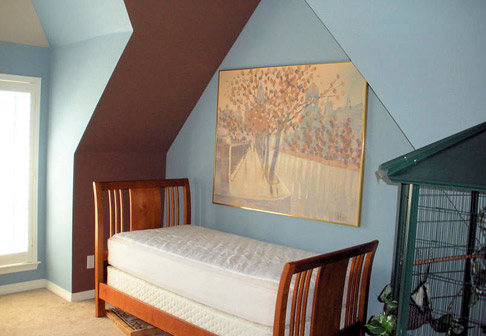Bedroom nook with pale blue walls