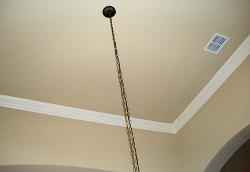 Freshly painted pale yellow ceiling and walls