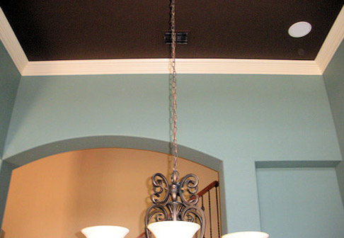 Brown ceiling and pale blue walls