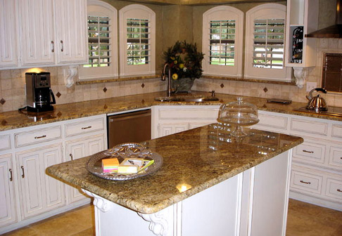 Kitchen with newly painted white cabinets