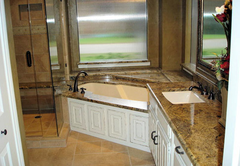Freshly painted bathtub in corner of bathroom