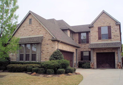 Exterior of brown brick house