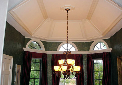 White ceiling above chandelier
