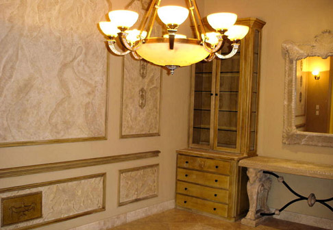 Room with chandelier and yellow walls