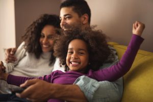 portrait of a family on the sofa