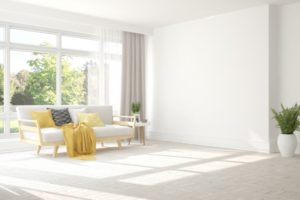 a decorated living room painted white