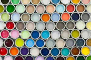 an assortment of paint cans