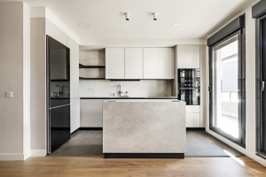 a modern kitchen with handleless cabinets