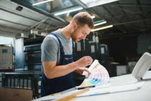 a person preparing to paint a warehouse