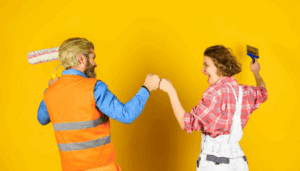 a team of painters painting a home