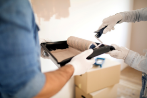 a person painting their home’s interior